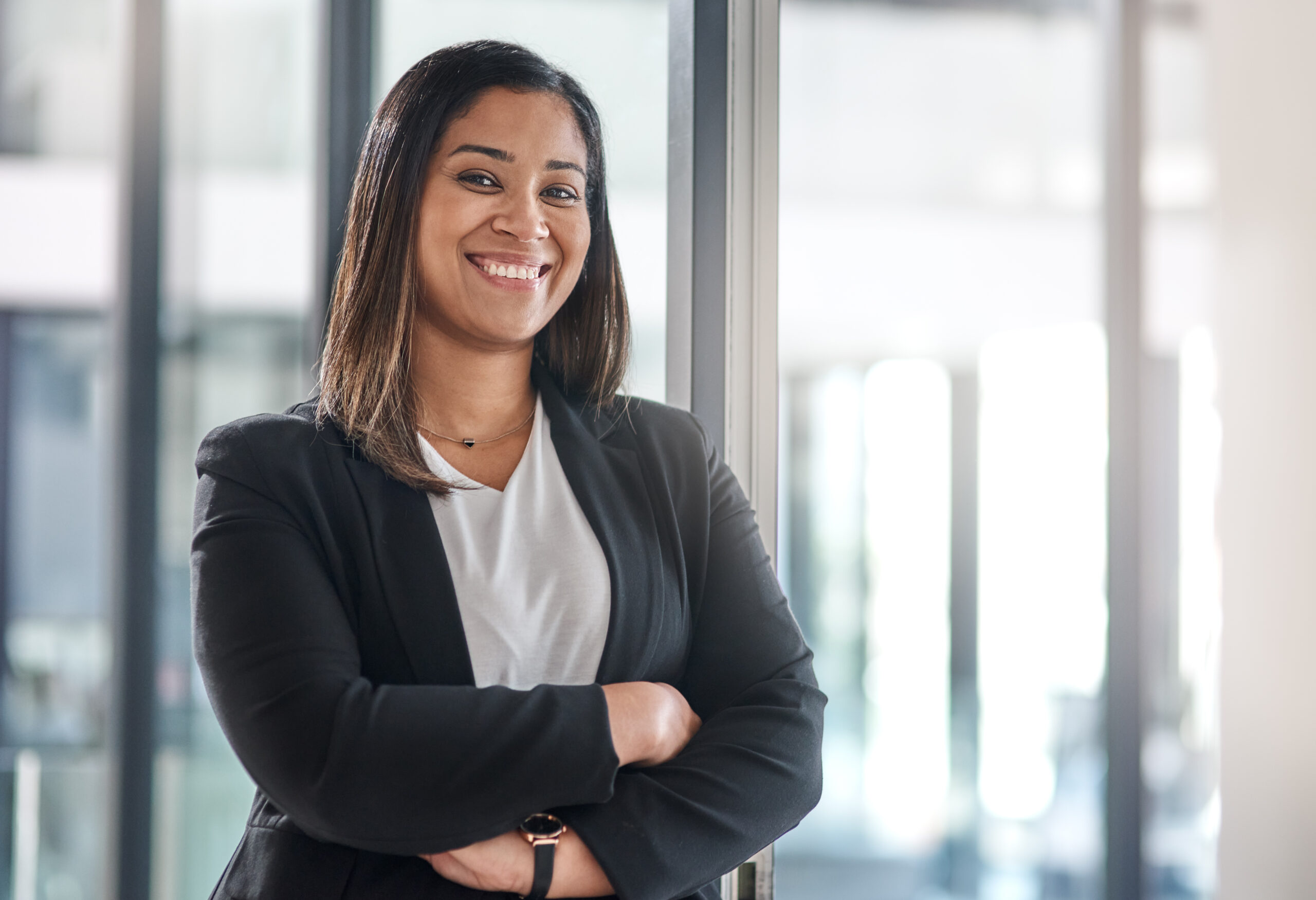 Portrait of a confident young businesswoman standing in an office.